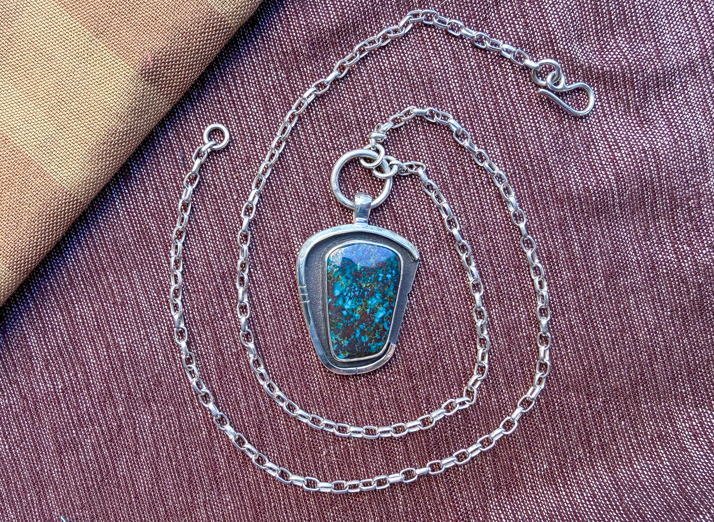turquoise shield talisman